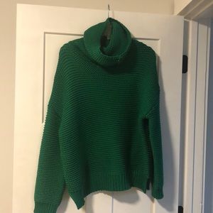 Cable knit green turtleneck sweater